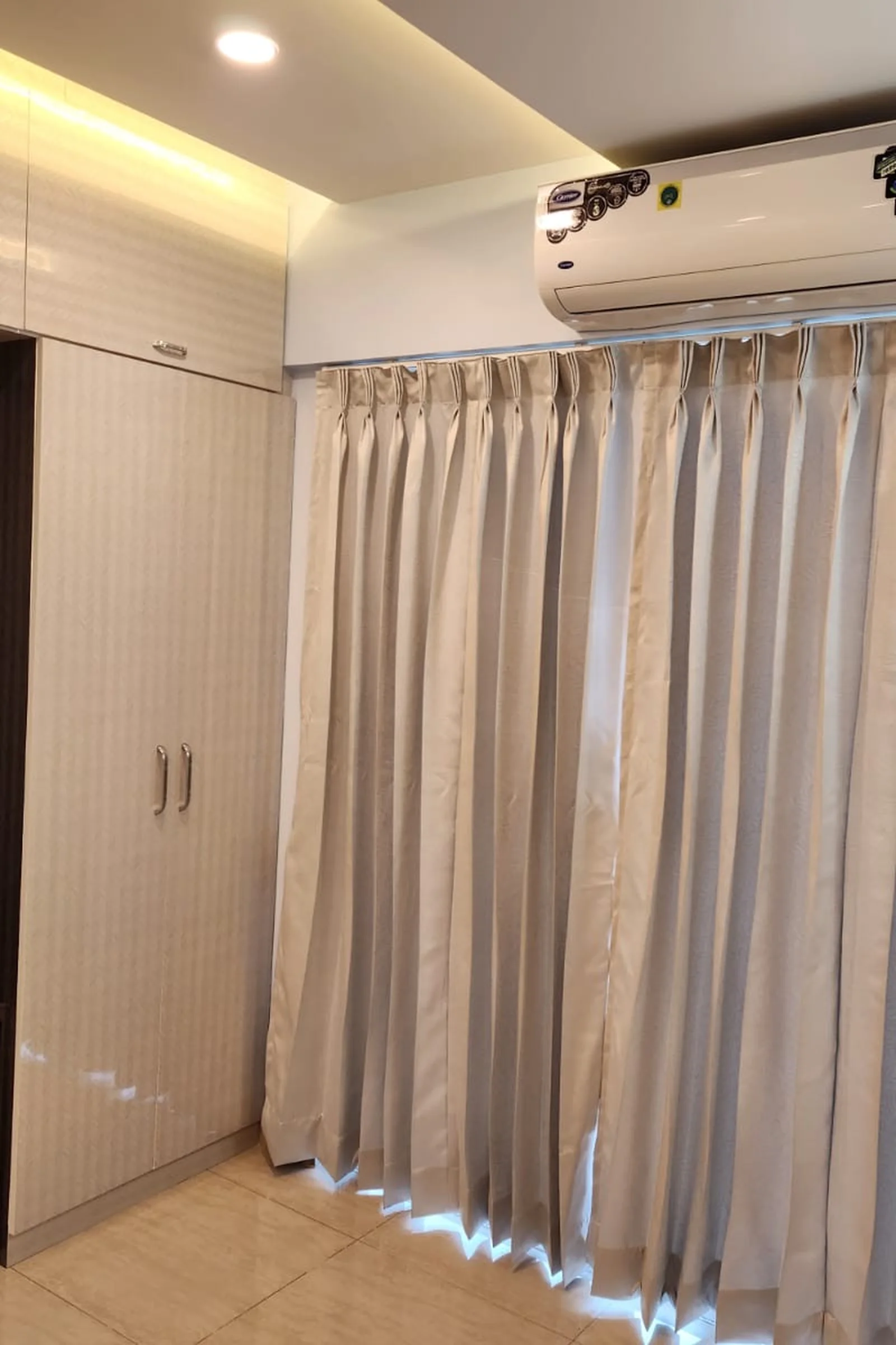 Floor-to-ceiling fitted wardrobe run with loft storage — 3 BHK home interior, Nyati Evita, Wagholi