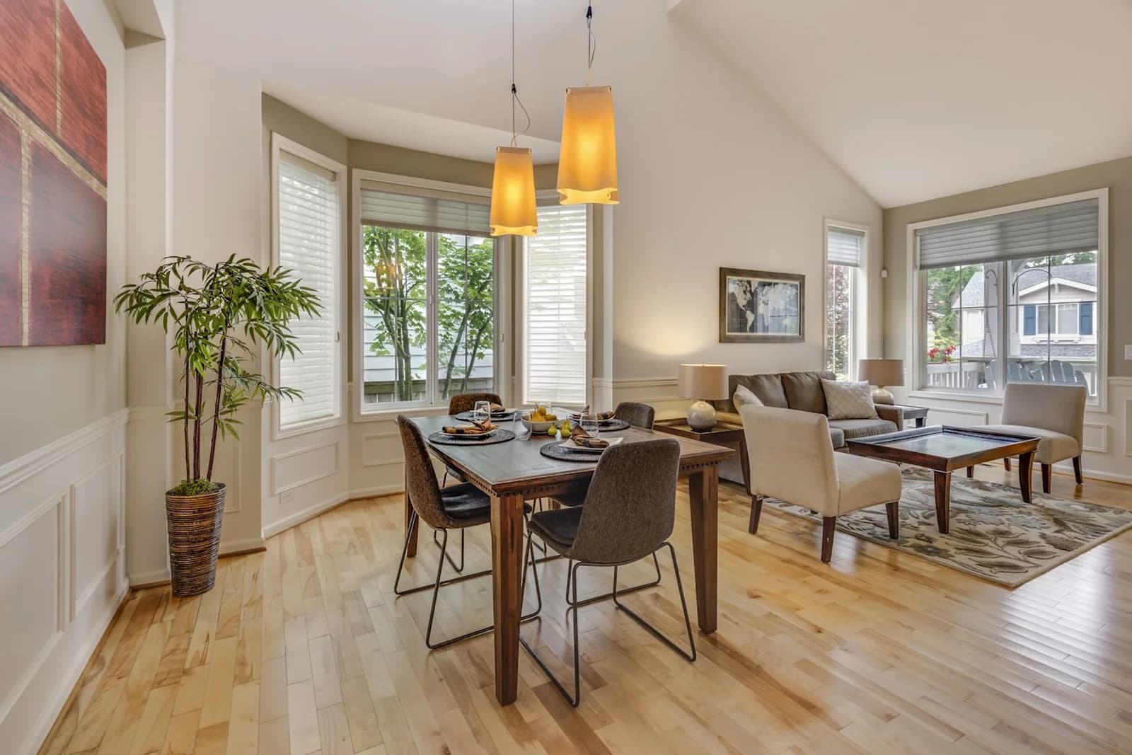 Open living and dining zone with pendant-lit dining table — 3 BHK, Ivy State, Wagholi