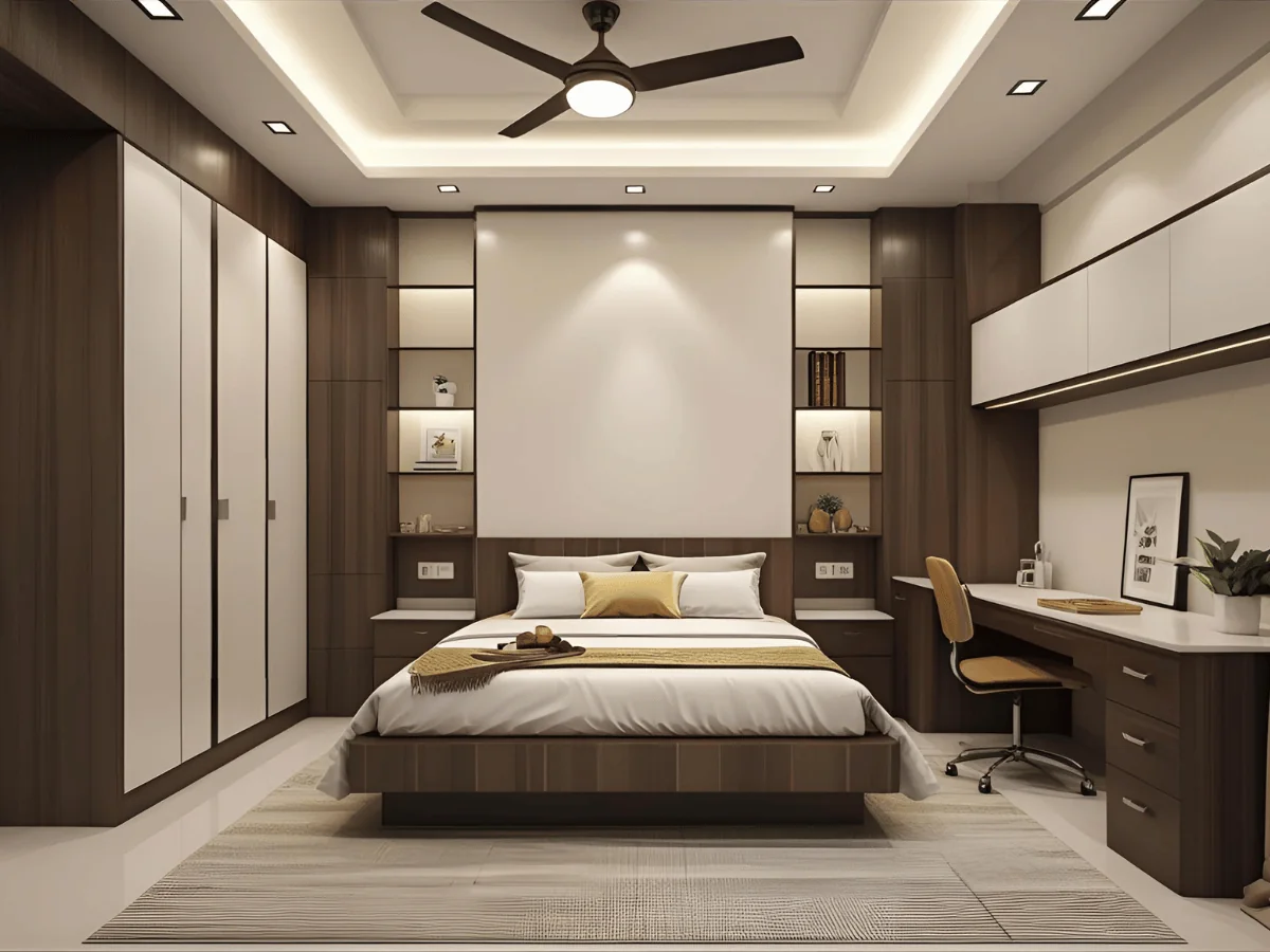 Bedroom with full-height wardrobe, bedside shelving and a built-in study desk in wood and cream finish — wardrobe and study unit Pune