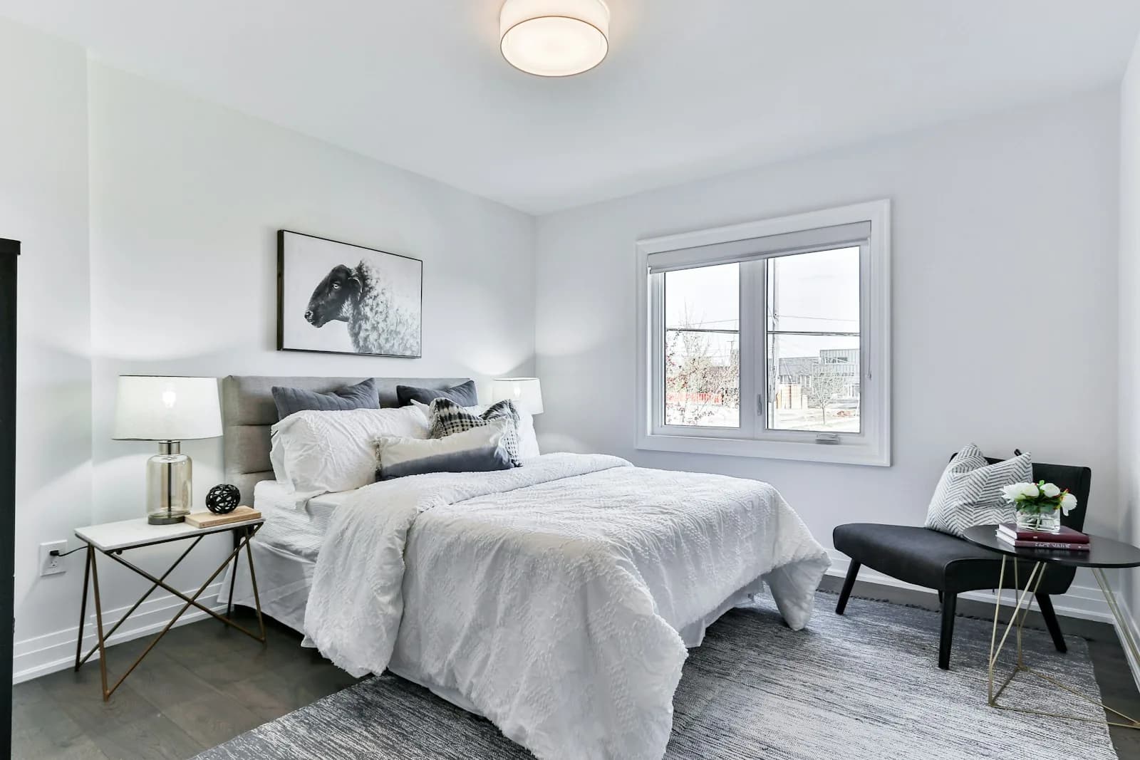 Fresh white painted bedroom with clean lines — low-odour home painting Pune