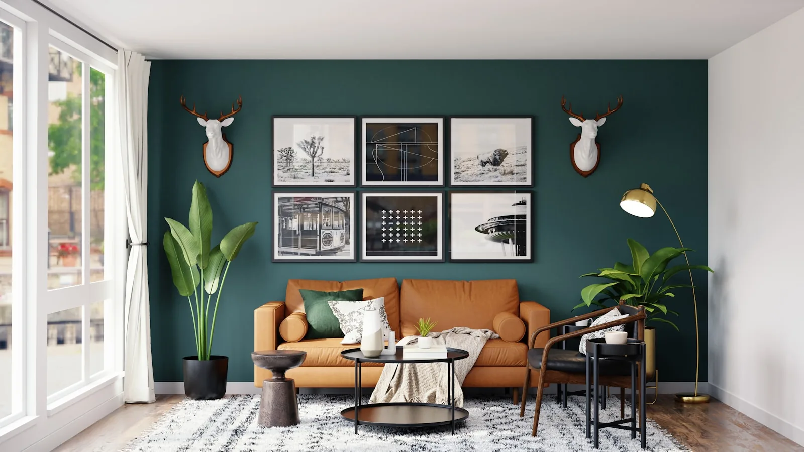 Deep green painted feature wall with tan leather sofa — feature wall painting Pune